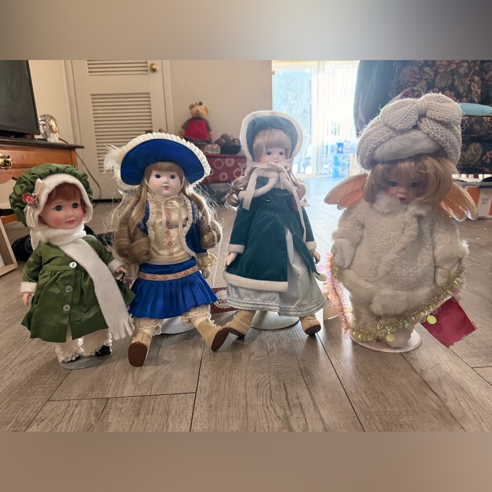 Set of Four Collectible Porcelain Dolls